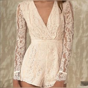 Jetset Diaries Voyage Romper Blush Long Sleeve Lace Playsuit Plunging